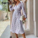 BerryGo Bohemian A-line split maxi wrap floral dress women Holiday female v-neck lace up dresses Elegant long sleeves vestidos